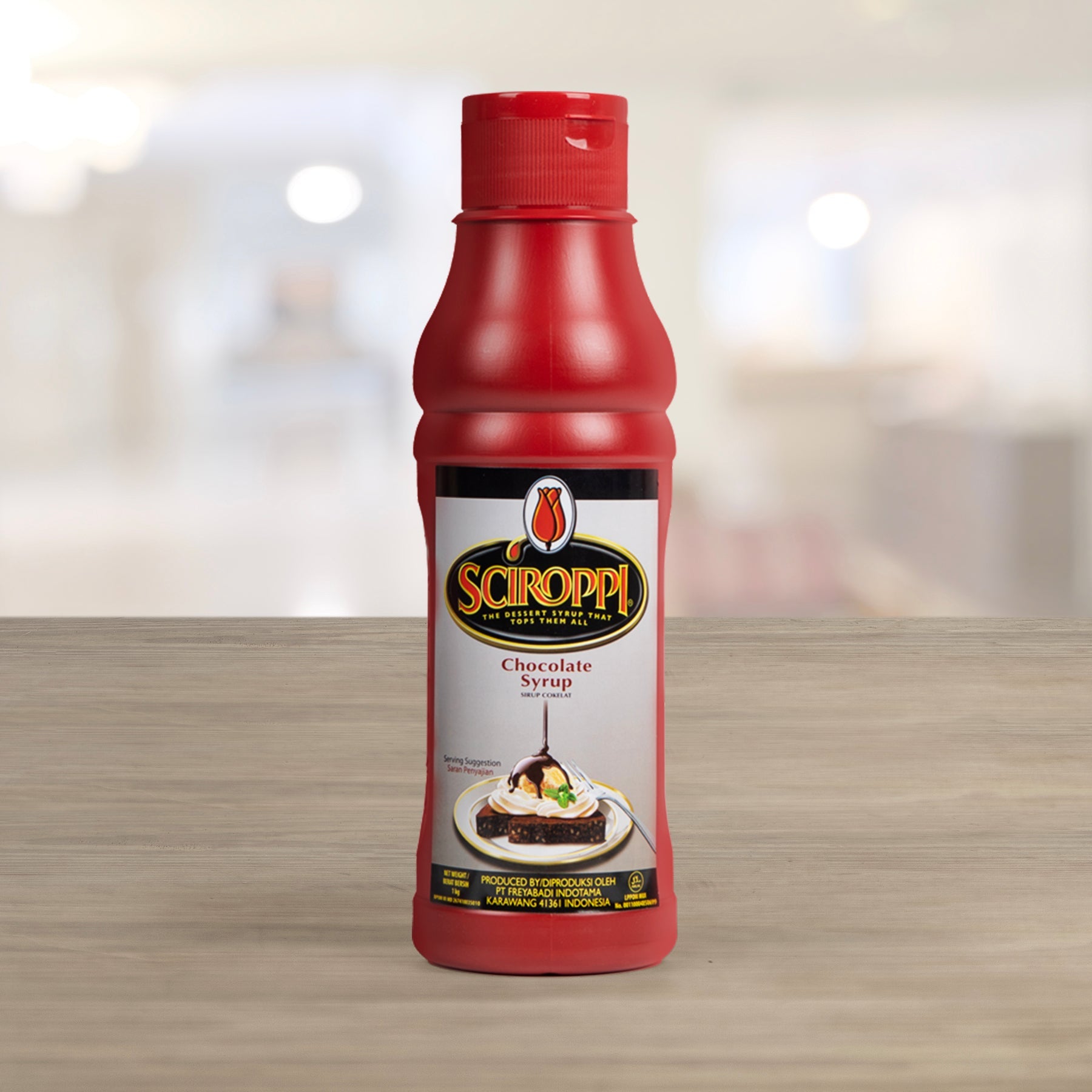 Package view of Tulip Sciroppi Chocolate Syrup 1kg (SKU: 8994592001717)